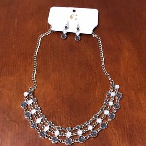 Neck legs and earrings